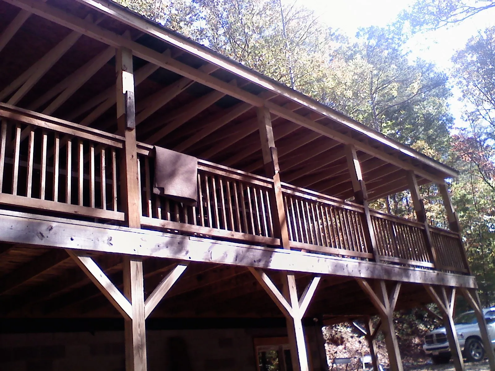 Timber framing under a new elevated porch and deck — Roof Leak Repair in Lake Station by Roofing Brothers
